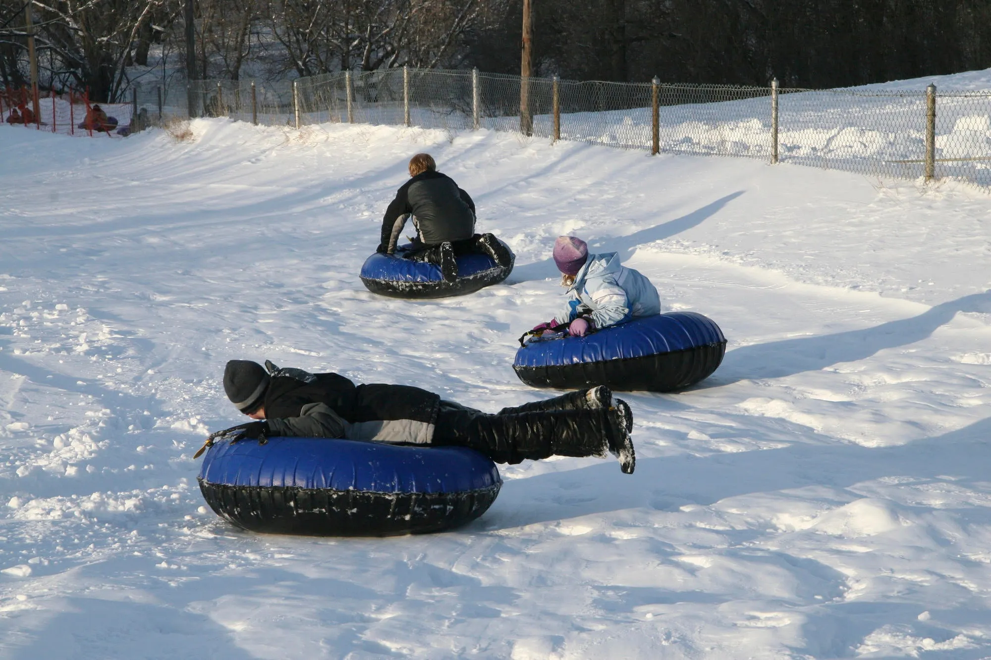 Set of 2 Bradley 50-Inch Snow Tubes with Heavy Duty Covers for Extreme Sledding Fun | Patented Inflatable Tubes for Performance | Made in USA